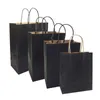 10 pcs / lot sacs-cadeaux avec poignées multi-fonctions sacs en papier kraft noir haut de gamme 6 tailles pour les magasins cadeaux de fête vêtements chaussures 210402