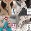 kleurrijke vrouwelijke tatoeages