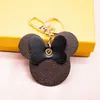 2021 Key chain Cartoon Fashion Handmade Leather Material Mens and Womens Handbags Pendant Car Keychains Lover Gift2304