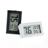 nuovo nero / bianco FY-11 Mini Digital LCD Ambiente Termometro Igrometro Misuratore di umidità Temperatura Frigorifero in camera ghiacciaia EWB5945