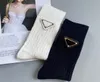 Autunno Inverno 2021 Designer Calze firmate unisex Pelle a doppio strato con logo in ferro Calze di cotone bianco nero Uomo Donna Calze sportive