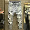 Hiphop High Street Fashion Heren Jeans 2021 Retro Gescheurde Vouw Stiksels Designer Motorrijden Slanke Broek254F