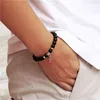 Bärade strängar naturliga svarta onyx pärlor armband mode vulkanisk lava religion korsa hänge charm för kvinnor män yoga smycken kent22