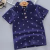 Camisa de pólo de verão menino menino menina de manga curta roupas de lapela para crianças estampas de algodão Tops respiráveis Crianças de criança 12m5y2724717