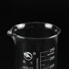 LAB -leveranser 1 stycke/parti 25 ml till 2000 ml mätkopp transparent borosilikatglasbägare med graderad skala för kemi -test