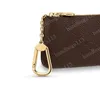 Porte-clés Porte-monnaie Porte-cartes pour hommes Sacs à main Chaîne en cuir Mini portefeuilles Porte-monnaie K05 852248H