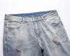 Herrenjeans High-Street-Fashion-Marke, schmal geschnittene Used-Jeans mit Loch und Katzenbart