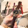 Varumärkesur för Women Lady Crystal Big Letters Style Leather Strap Quartz Wrist Watch L50235i