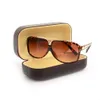 God kvalitet Womans Solglasögon Luxury Mens Sun Glasögon UV Skydd Män Designer Glasögon Gradient Metall Hinge Fashion Women Spectacles med lådor Glitter2009 50