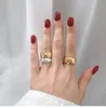 Mode designers kvinnor ring titan stål bred och liten rutig par ring guld silver ros guld finger ring bröllop smycken gåva