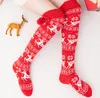 Chaussettes hautes tricotées pour femmes Motifs de vacances de Noël Flocon de neige Bas longs pour les genoux d'hiver Funky Jambières Chaussettes de sol Rouge