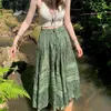 зеленая плиссированная юбка