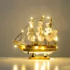 With LED Light Caribbean Black Pearl Sailing Boats Wooden Sailboat Model Home Decoration Accessories for Living Room 210811