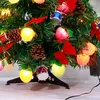 Juldekorationer DIY miniträd med färgglada fruktlampor röd båge trumma naturligt tallbord heminredning