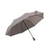 Ett paraply som kan omvandlas till en handväska, kreativ tri-vikning, automatisk öppning och stängningspåse paraplyer