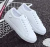 Kvinnor Casual Shoes Fashion New Woman PU PU Läder Skor Ladies Andas Söt Hjärtlägenhet Vit Sneakers