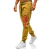 Pantalons pour hommes de marque nouvelle mode imprimé grande taille attache élastique pantalons décontractés pour hommes pantalons de sport pantalons de jogging hommes Y0927