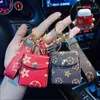 Porte-clés de voiture accessoires de luxe en cuir marque amour pour les femmes boucle cadeau créatif Girly voiture porte-clés anneaux pendentif décoration H112307z