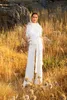 Witte veer jumpsuits trouwjurken bruidsjurken hoge nek vestidos de novia satijn boho sweep trein mariage jurk