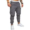 Jesień Mężczyźni Spodnie Hip Hop Harem Joggers 2020 Nowe męskie spodnie męskie Solidne multi-kieszonkowe spodnie dresowe M-4XL Y0811