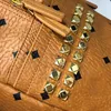 Mini Çapraz Sırt Çantası Seyahat Su Geçirmez Baskılı Mini Sırt Çantaları Unisex Mektubu Hakiki Deri Sequins Fermuar Yumuşak Satchels Bölmesi Kadın Moda Okul Çantası