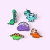 Dinosaur with books Brooch Pins Enamel Animal Lapel Pin for Women Men Top Dress Cosage Fashion Jewelry Will and Sandy