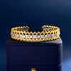 Braccialetti placcati oro 18k di alta qualità di alta qualità Braccialetti di fascino del braccialetto del braccialetto del diamante ghiacciato di rame dell'amore per le donne Pochette Bijoux Accessori all'ingrosso