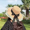 Соломенные шляпы женщина досуг лук широкий Breim Hat на открытом воздухе на отпуске солнцезащитный крем солнечная шапка