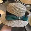 Mode Vintage Vrouwen Strohoed met Bowknot Outdoor Beach Sun Protection Cap Vakantie Travel Classic Stingy Brav Hats