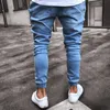 Qnpqyx män stretchy rippade skinny biker jeans förstörda slim passform denim byxor mens elastiska midja harem byxor män jogger kläder