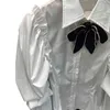 TWOTWINSTYLE Elegante Patchwork Bowknot Camicia con diamanti per donna Bavero Flare Manica lunga Camicetta bianca Moda femminile Elegante 210517