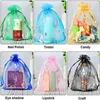 100pcs / lot organza 가방 투명 샘플 Drawstring 파우치 저장 가방 결혼 생일에 대 한 크리스마스 쥬얼리 선물