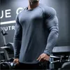 T-shirt da uomo 2022 Autunno Manica lunga da uomo O-Collo T-shirt in cotone Bodybuilding Allenamento Skinny T Shirt Uomo Palestra Fitness Tee Tops