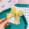 Nuevo coreano dulce niña princesa Simple pequeño fresco lunares lazo de hilo Clip de pico de pato moda niños horquillas accesorios para el cabello