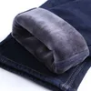 Winter Men's Warm Slim Fit Jeans Business Fashion Thicken Denim Trousers Fleece Stretch Brand Pants Black Blue 211008