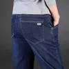 YMWMHU эластичные джинсы мужские бизнес мода летние тонкие твердые джинсовые брюки осени случайный брюки классический тонкий джинс плюс размер 210331