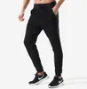 Jogging-Yoga-Outfits für Herren, Sport-Freizeithosen, Laufen, Fitness, Fitnessstudio, Kleidung, Herren-Strumpfhosen, lockere, elastische Trainingshose mit mehreren Taschen und Reißverschluss