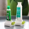 Manual Toothpaste Squeezer Rolling Tube Toothpastes Seat Holder Stand Rotate Dispenser For Bathroom Toilet