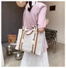 أزياء قماش حقيبة اليد حقيبة الكتف حرف طباعة شريط كبير سعة حمل أنثى الحقائب اليابانية غير الرسمية 294H