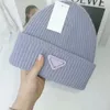 2021 Nouveau bonnet d'hiver hommes femmes loisirs tricot bonnets Parka couvre-tête amoureux de plein air mode hivers chapeaux tricotés accessoires cadeau