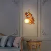 Lampe murale rétro de paon de paon créatif or peint à la main peint de paons de décoration intérieure pour magasin d'hôtel