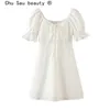 beauty Casual Style White Mini Dress Women Holiday Ruffles Bow Ladies es Summer Deep V-neck Sexy Cotton 210514