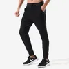 Men's Jogging Yoga Outfits Sports Casual Pants Running Fitness Gym Clothes Men Tights Loose Multi Pocket Zipper Elastic Workout Trouses