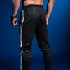 Pantalones de jogging para hombres GYM Ropa deportiva Pantalones deportivos Pantalones deportivos para correr para hombres Pantalones deportivos para correr con bolsillos 4