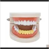 Grillz, Dental Grills Body Drop Delivery 2021 Hip-Hop Girllz Gioielli di lusso da uomo Placcato in oro Hip Hop Brace Denti di alta qualità Aessories Wholes