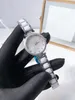 Мода мать жемчужной циферблата дизайн белый керамический ремешок часы для женщин кварцевые часы серебра из нержавеющей стали керамики наручные часы 33 мм