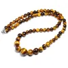 collier de perles en oeil de tigre