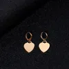 Stud haute qualité bijoux femme Simple doré métal paillettes amour coeur boucles d'oreilles vente belle gracieuse filles cadeau accessoires