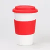 Porselen kupalar kaymaz olmayan anti-scald beyaz seramik kupa düz renkli silikon kapaklı ve yalıtımlı manşon seyahat kahve fincanı taşınabilir çömlekçi su şişesi zl0046sea