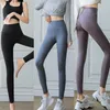 Printemps et automne Taille haute Lettre Shark Skin Leggings Sports Womenyoga Slim Nine Point Gym Fiess Pantalon liquide 210820